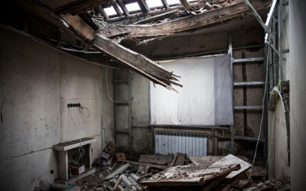 Deteriorating room of an abandoned property.