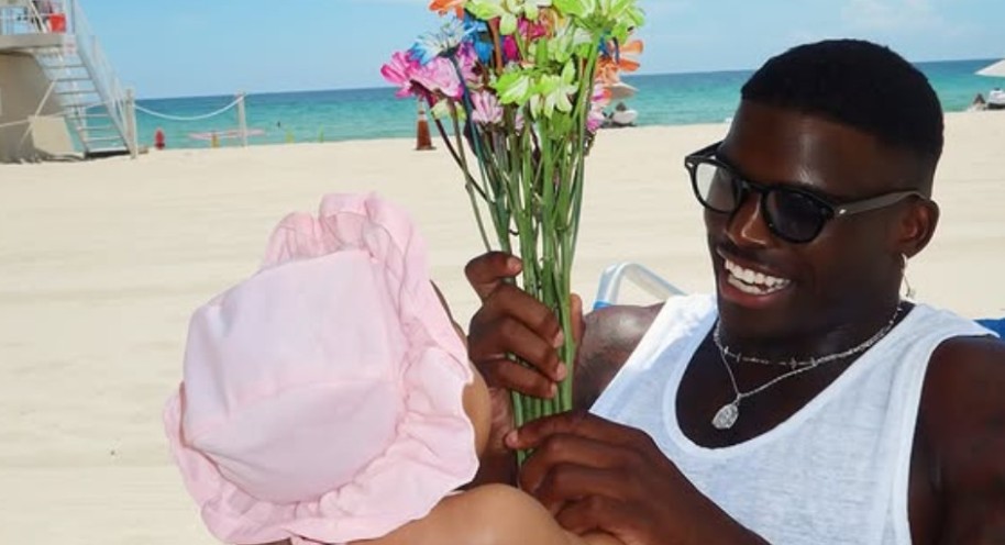 Tyreek Hill and baby Capri